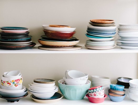 messy pile of dishes on a counter